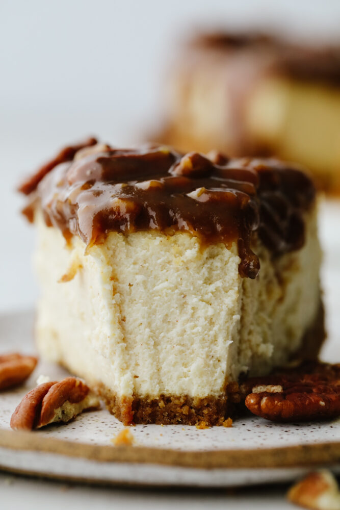 Closeup of pecan pie cheesecake slice.