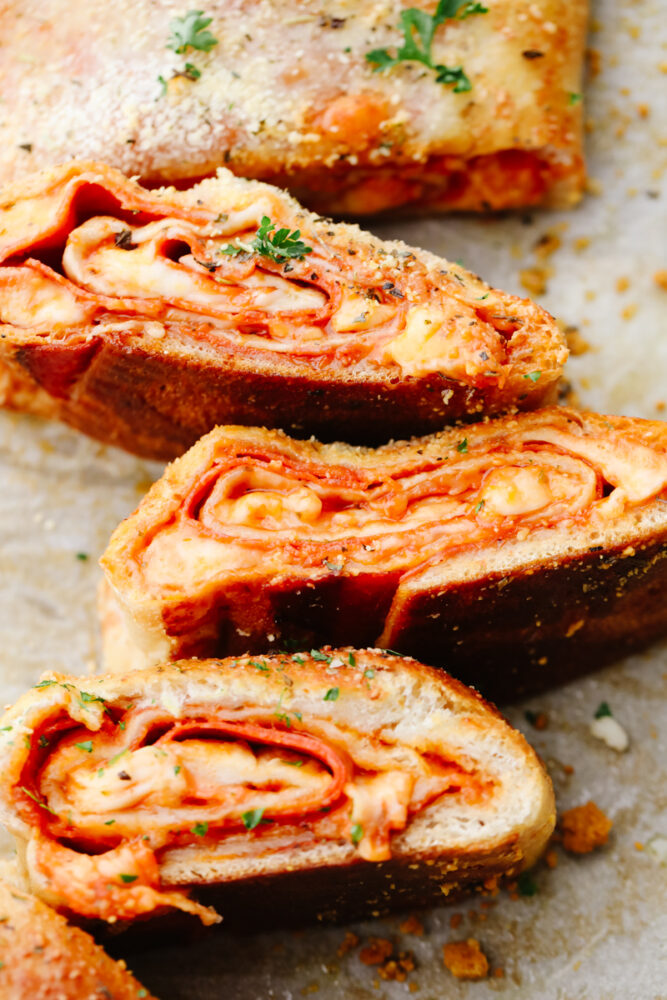 A pepperoni roll cut into individual slices. 