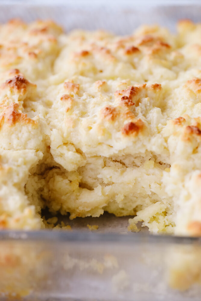 A close up of swim butter biscuits in a pan. 