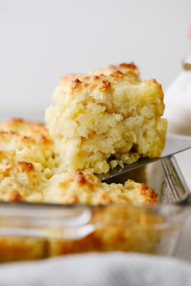 A biscuit being served out of the pan. 