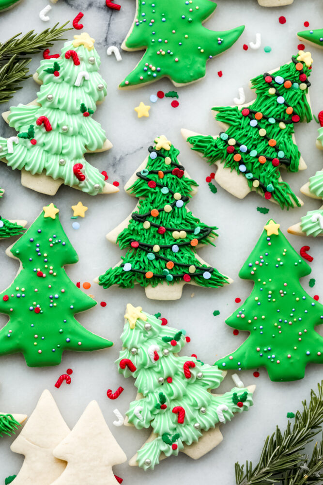 A variety of Christmas tree cookies.