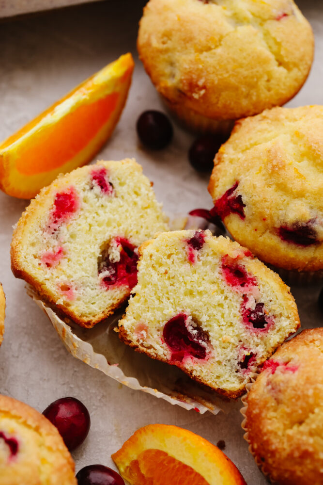 A cranberry orange muffin cut in half.