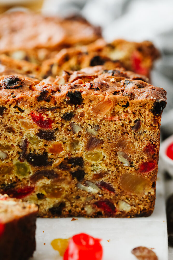 Closeup shot of a slice of fruitcake.