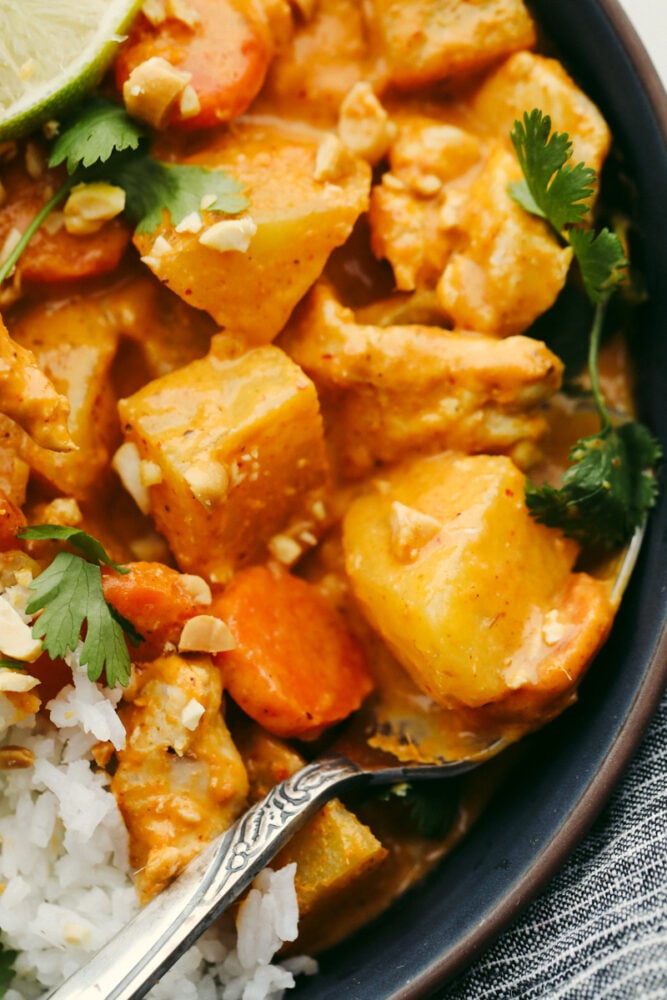 Massaman Curry in a bowl with white rice. 