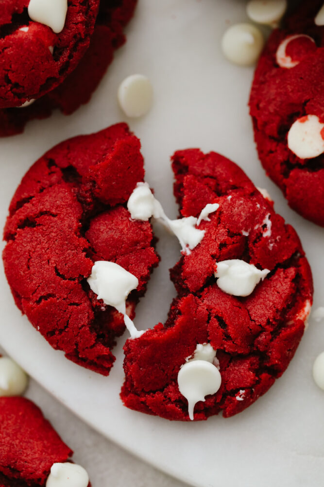 Closeup of a cookie broken into 2 pieces.