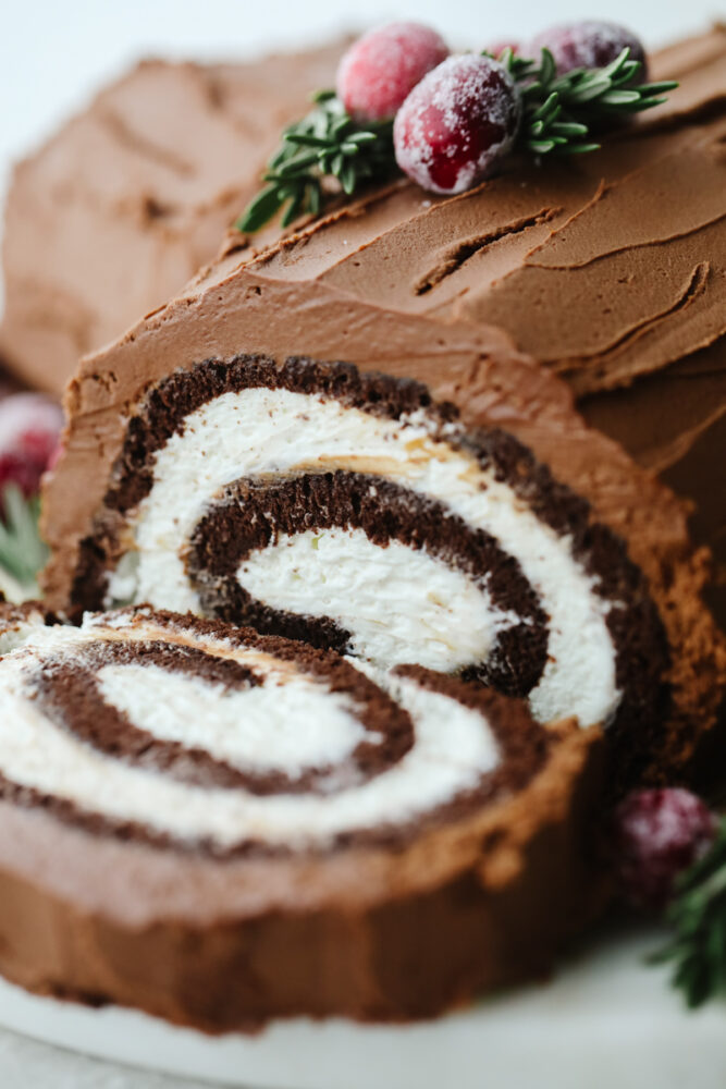 A close up of a yule log cake. 