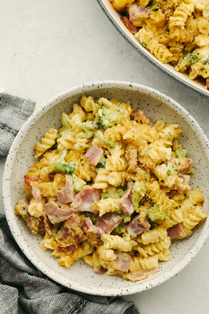 Cheesy ham casserole in a bowl, ready to eat. 