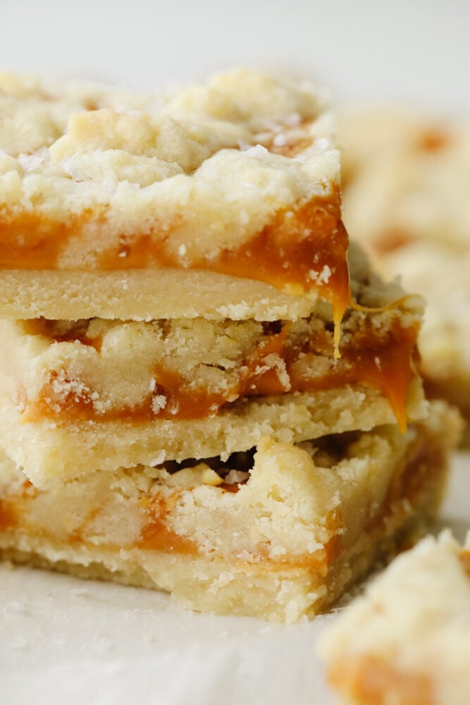 A zoomed in stack of salted butter caramel bars. 