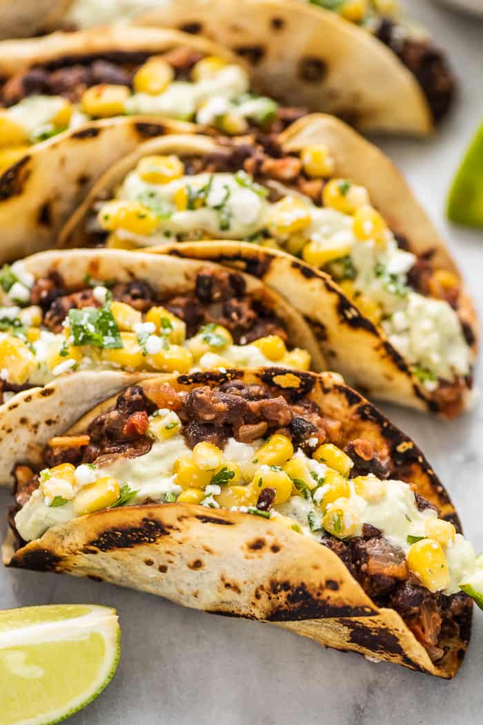 a close up of black bean tacos