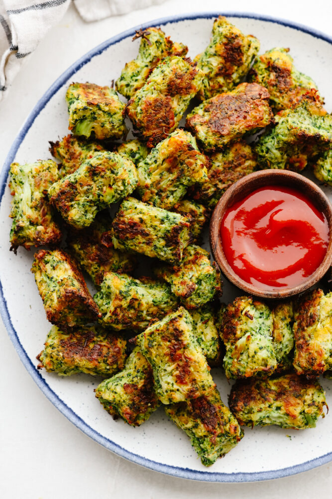 A plate of broccoli too with some ketchup. 