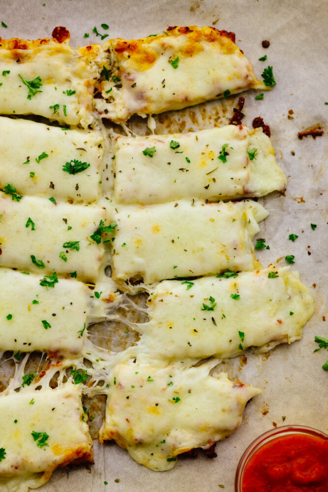 Cauliflower breadsticks cut into 10 pieces.