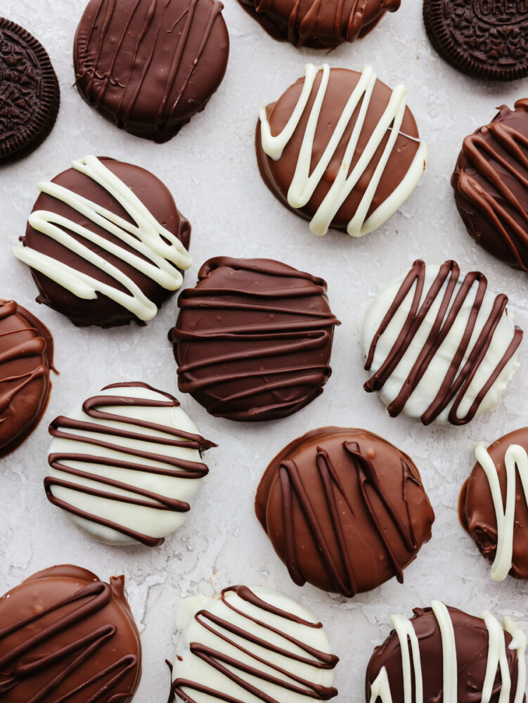 A variety of white, milk, and dark chocolate covered Oreos.