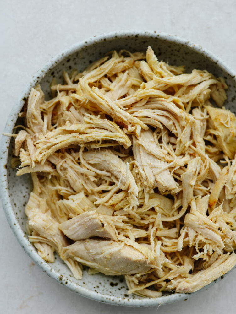 A bowl of shredded chicken. 