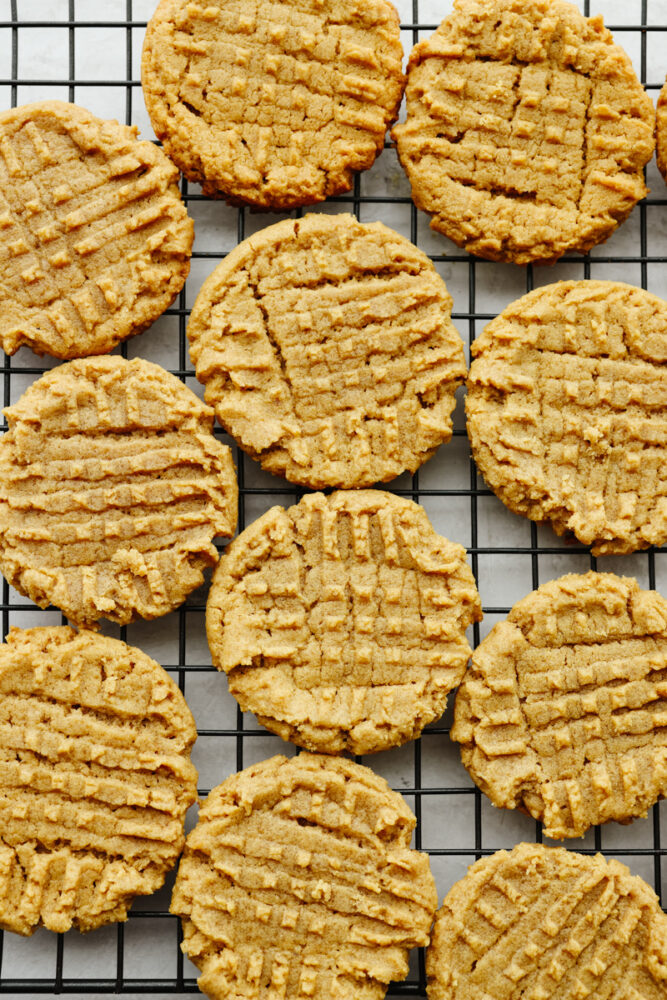 Flourless peanut butter cookies on a cooling rack.