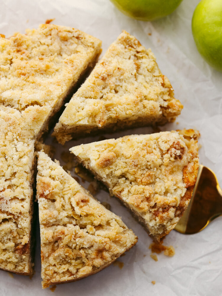 An Irish apple cake cut into 3 pieces.