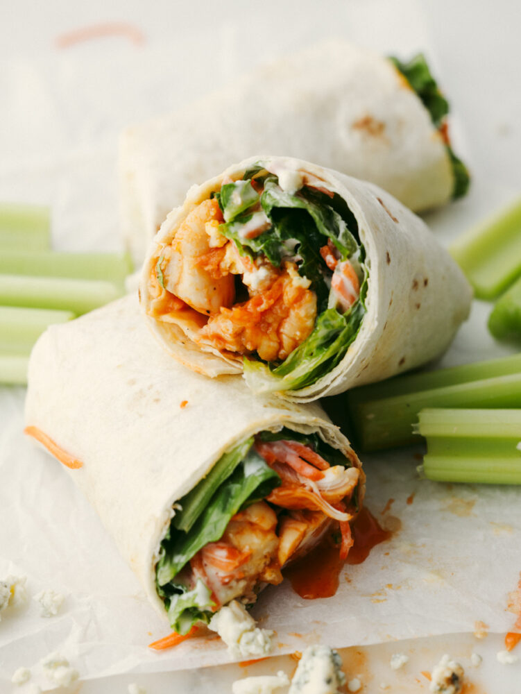 A honey buffalo chicken wrap, pictured alongside celery.