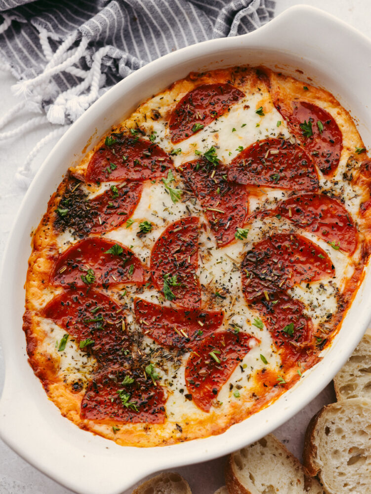 A top view of pepperoni pizza dipped baked and in a casserole dish. 