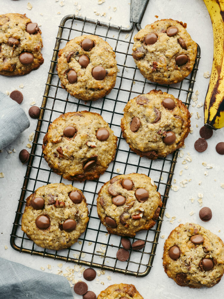 Top-down view of cookies on a cooling rack.