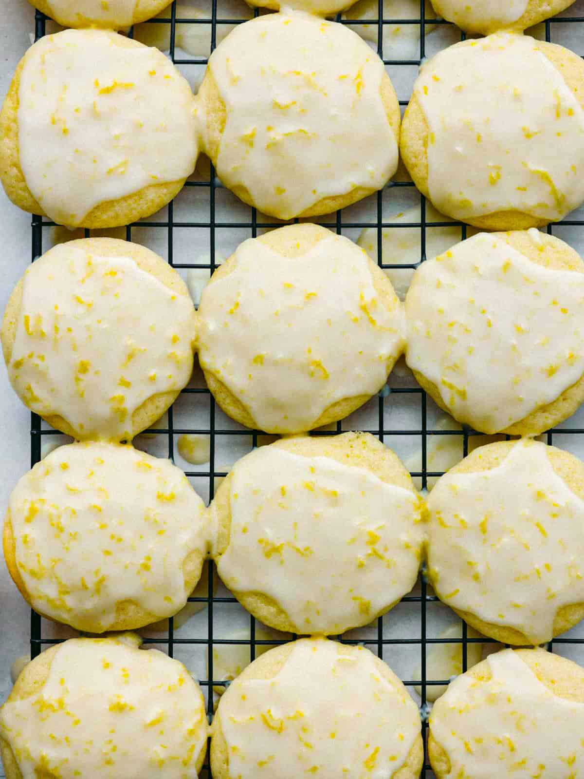 Overhead shot of lemon ricotta cookies on a cooling rack.