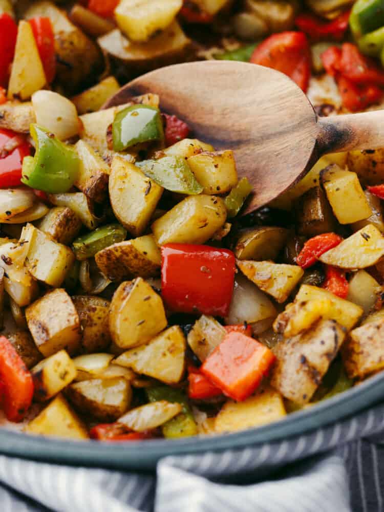 A close up of cooked breakfast potatoes.