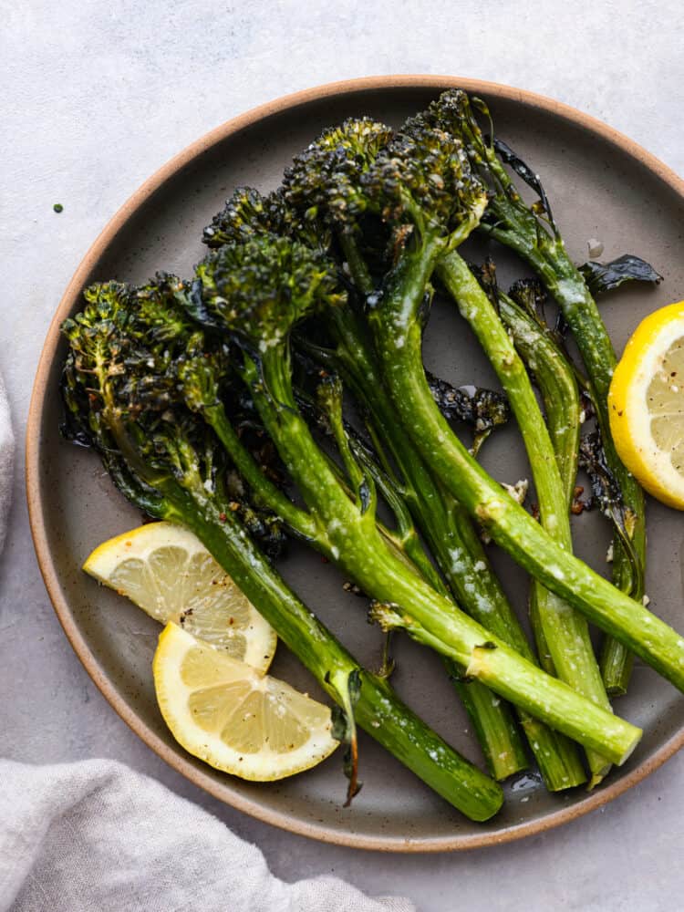 A plate of roasted lemon garlic broccolini. 