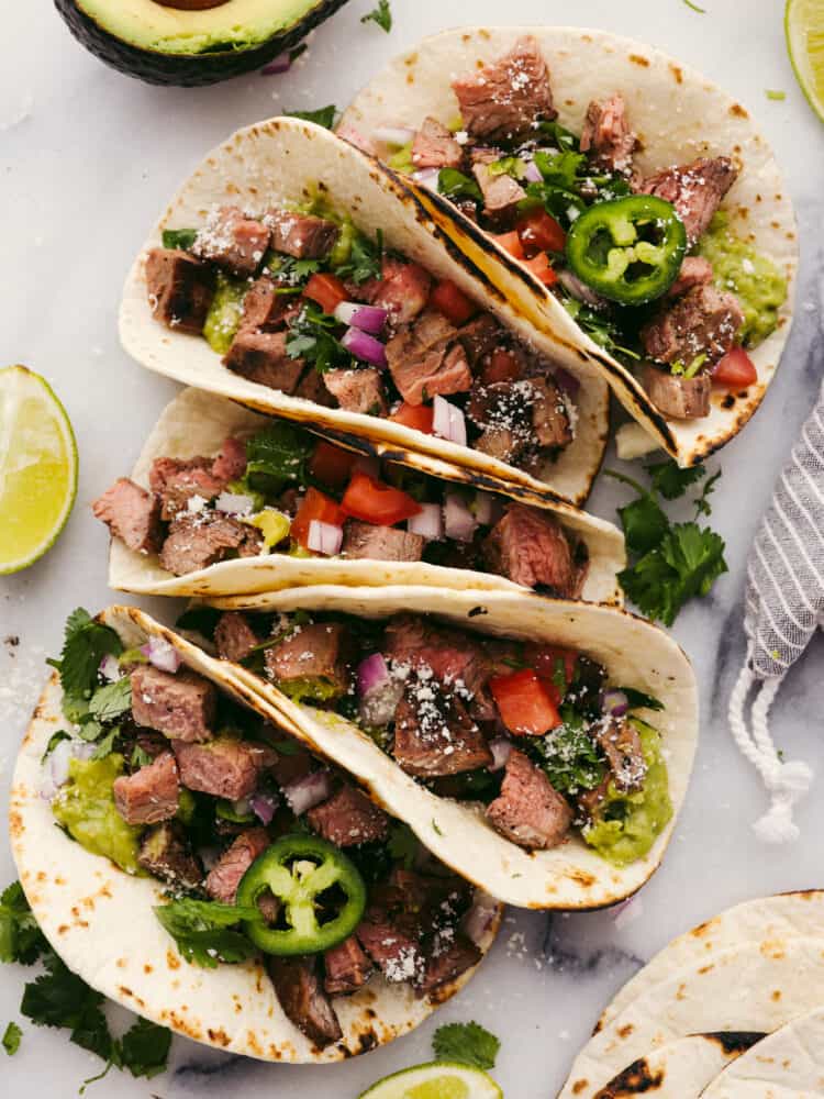 The top view of assembled carne asada tacos. 