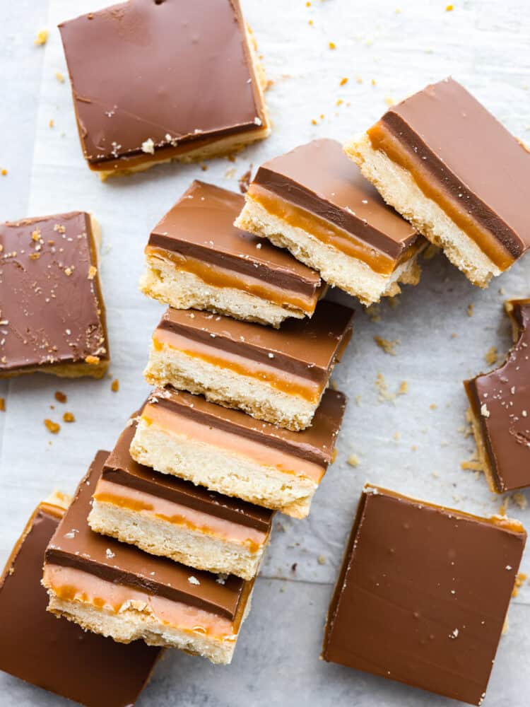 The top view of Twix bars cut into squares and laid on theirs sides so that you can see the layers. 