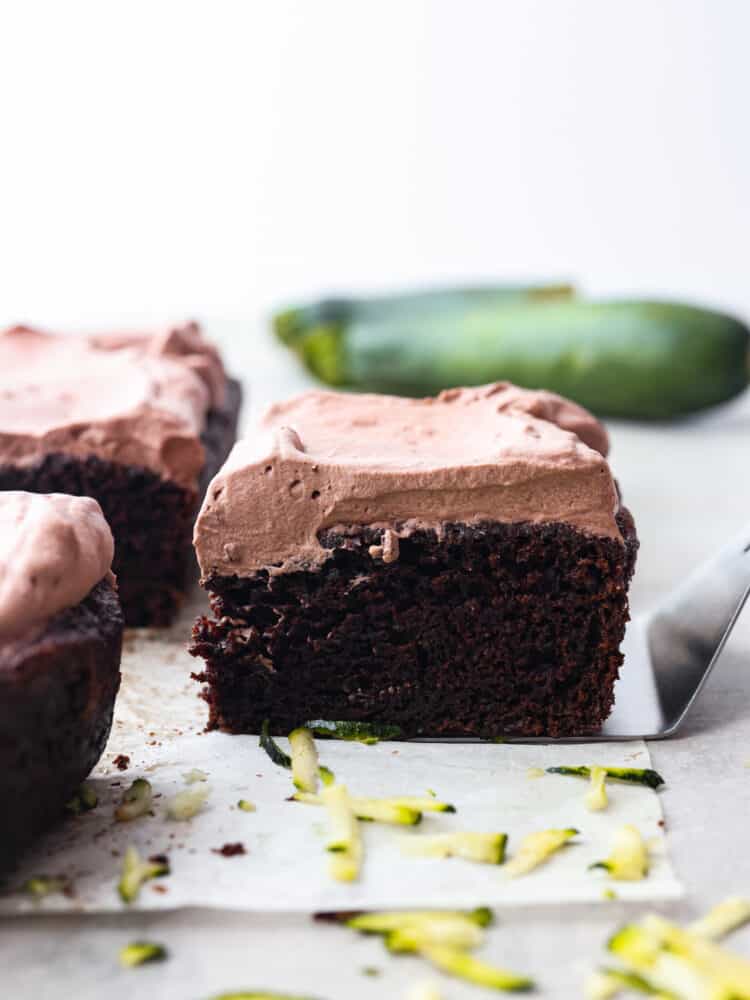 The side view of a slice of chocolate zucchini cake. 