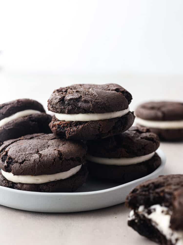 Homemade oreo cakesters stacked on a plate. 