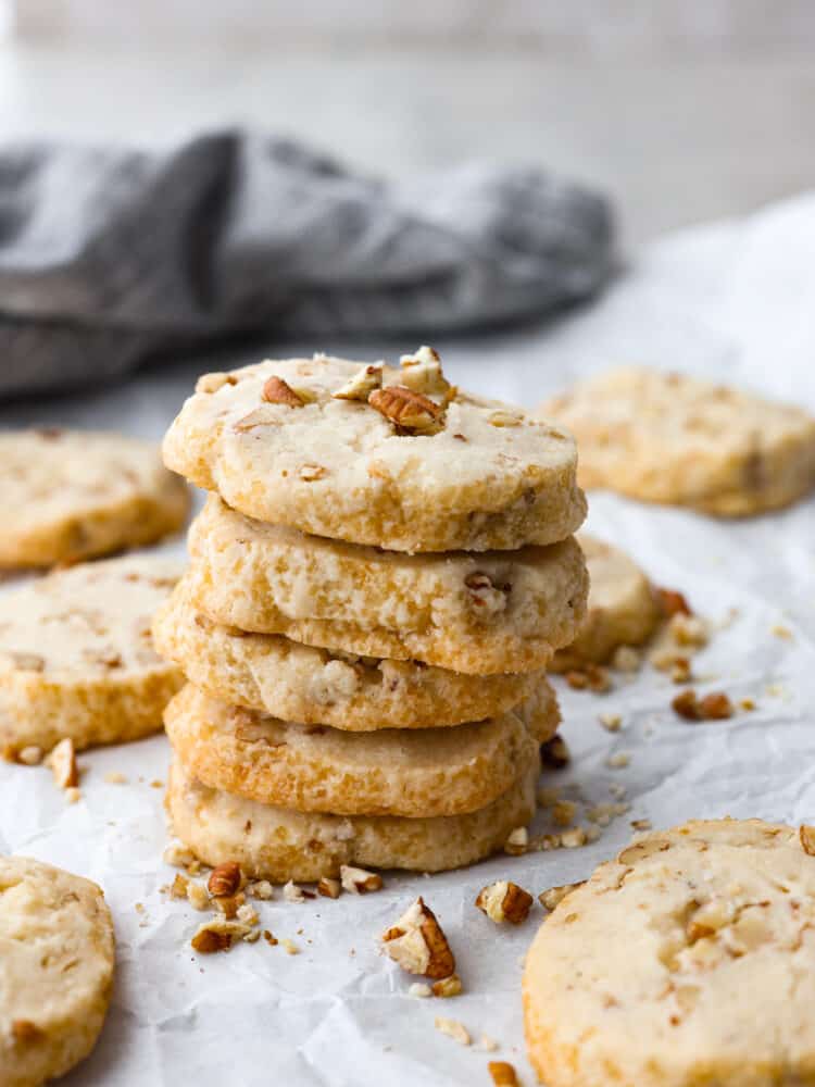 A stack of pecan shortbread cookies. 