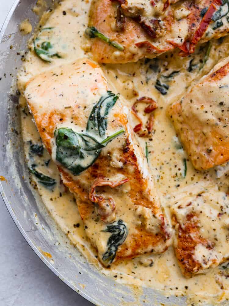 A closeup of creamy tuscan garlic salmon. 