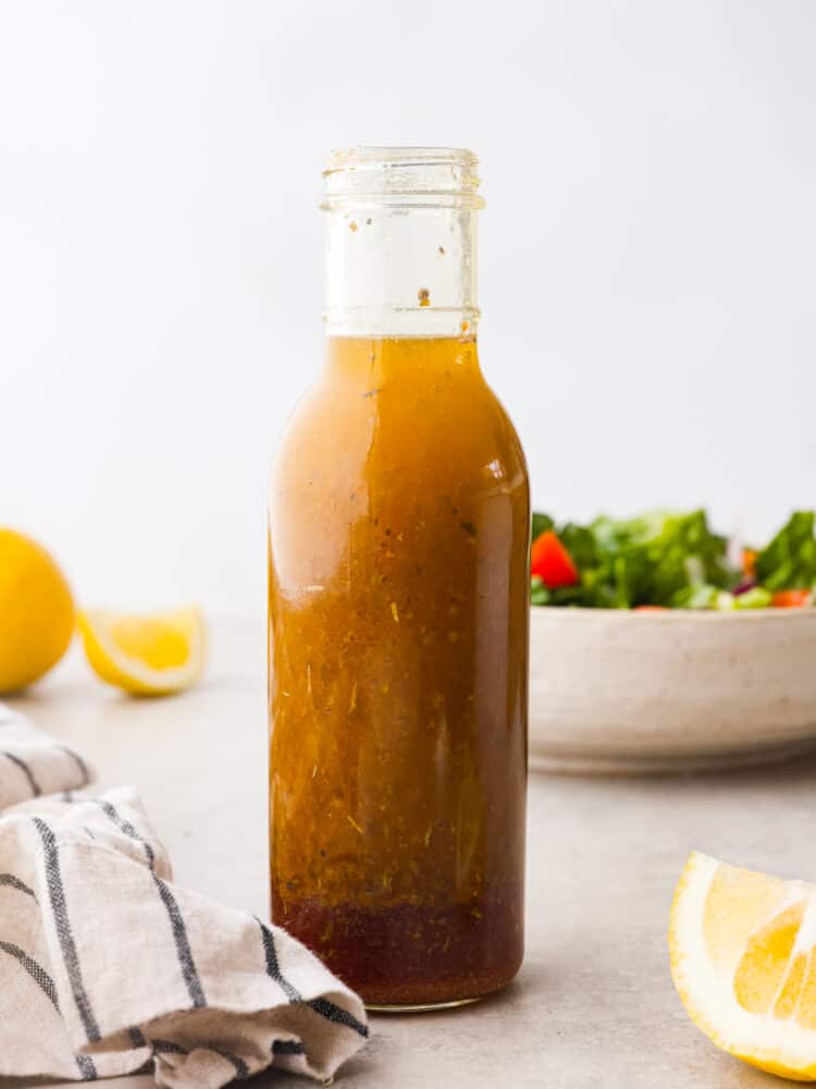 A glass bottle of Italian Salad Dressing. 