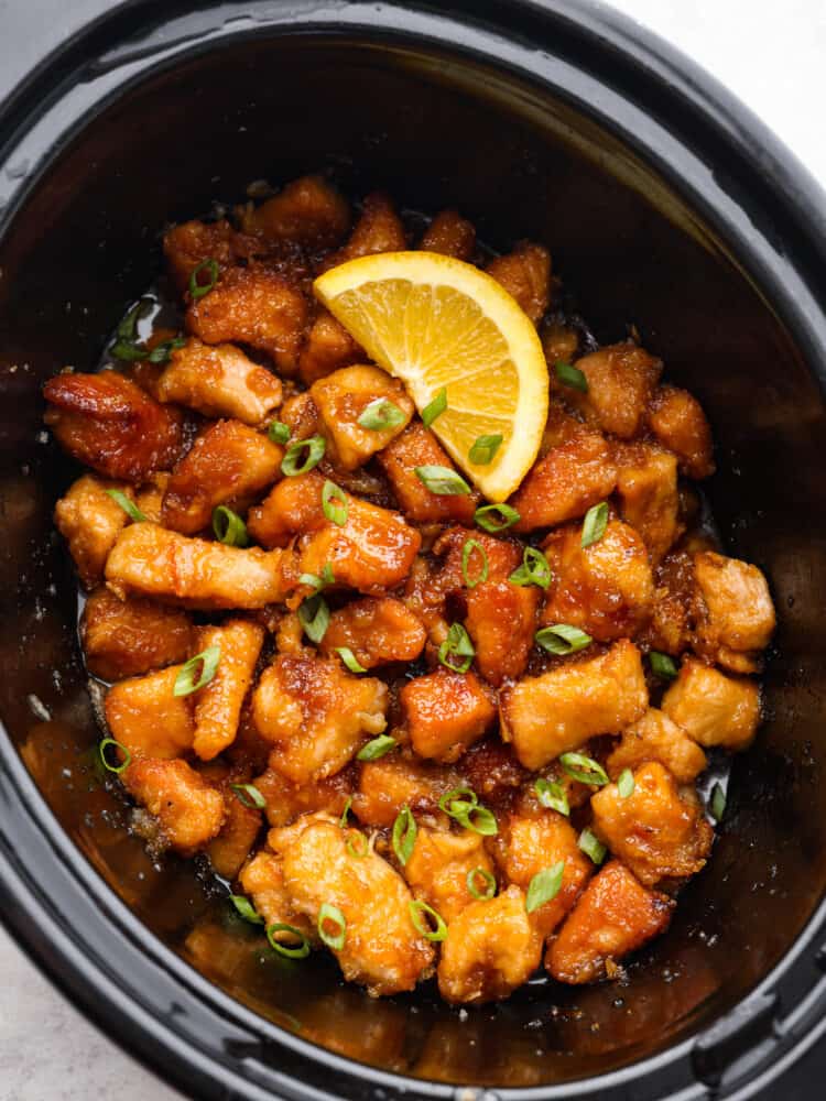 Cooked orange chicken in the crockpot. 