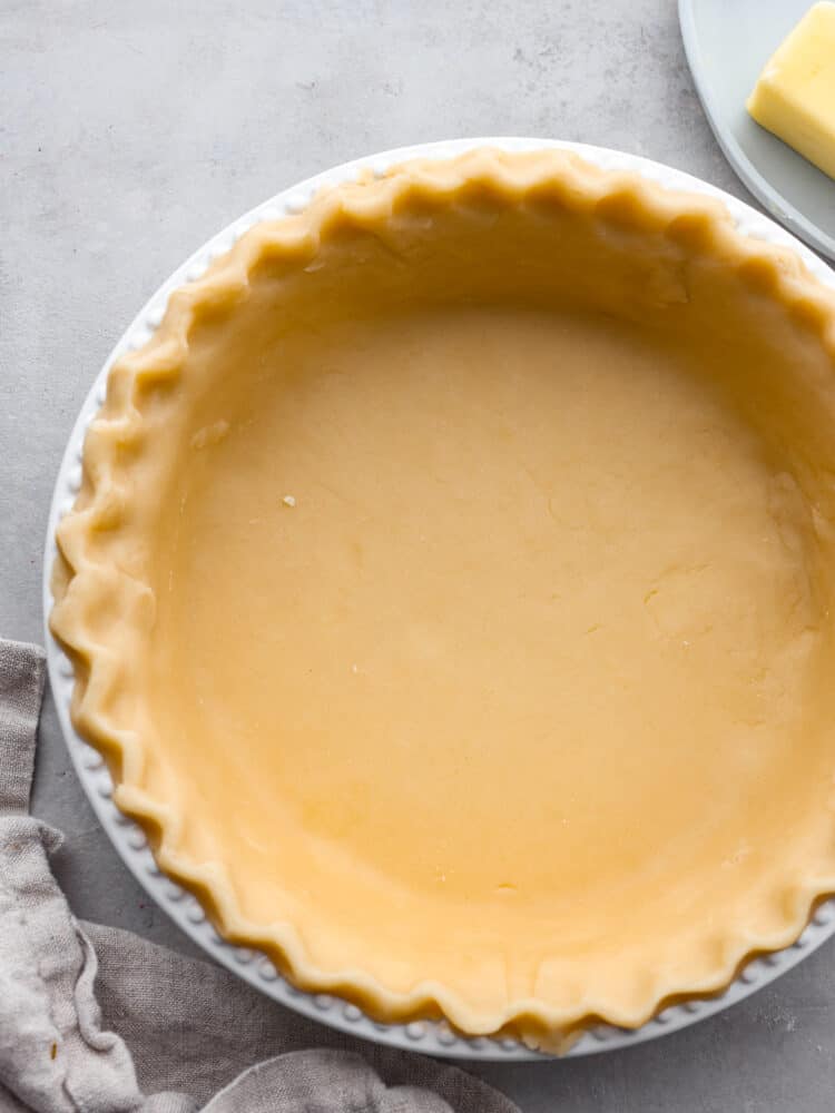 Butter pie crust in a pie pan unbaked.