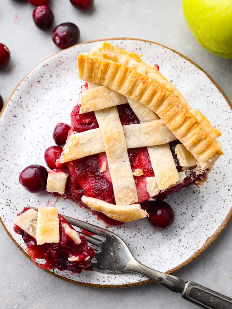 Top-down view of a slice of pie with a bite taken out of it.