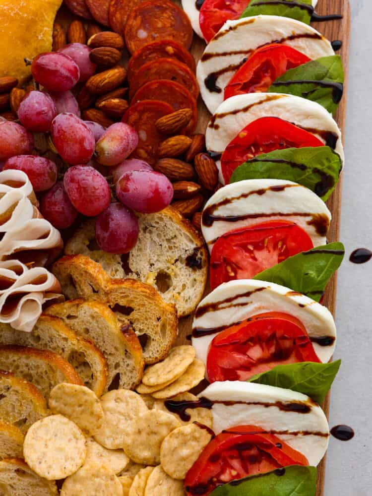 A close up on the caprese salad and crostini.