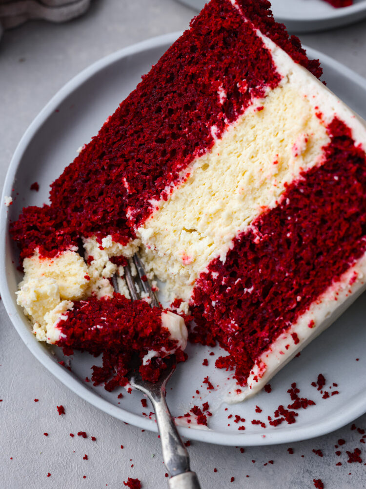 Closeup of cake with a bite taken out of it.