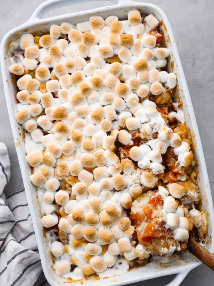 Top-down view of sweet potato cobbler in a white baking dish.