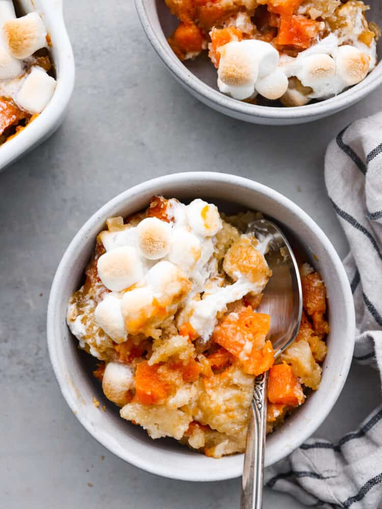 Top-down view of sweet potato cobbler in a white bowl.