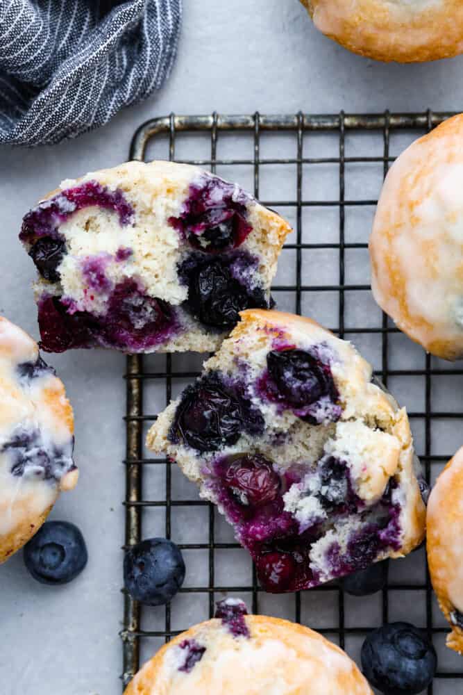 Top-down view of a blueberry muffin cut in half.