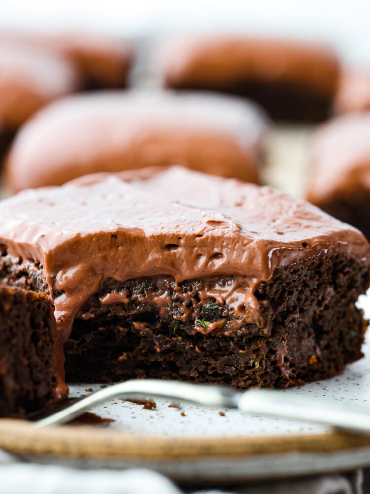 A close up on the healthy brownies with a scoop taken out of it.