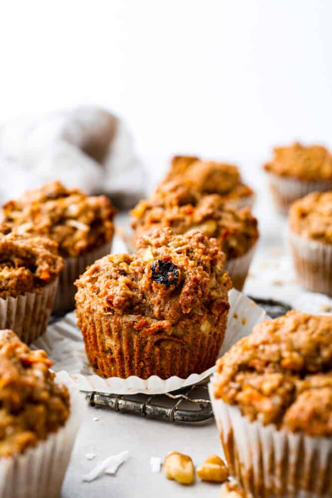 Morning glory muffins on a wire rack.