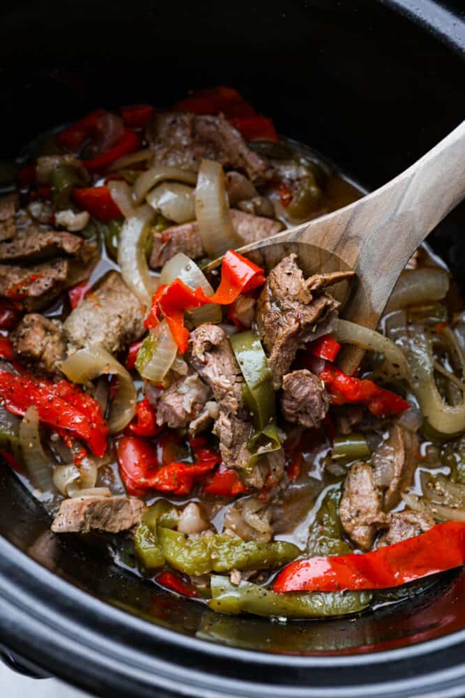 A close up look at the meat in the slow cooker.