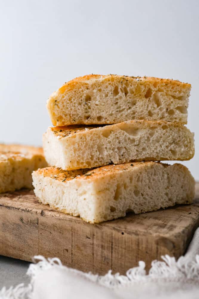 Focaccia bread on a cutting board.