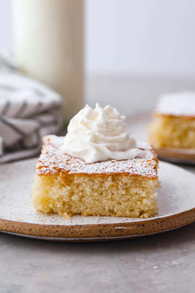 Hot milk cake with whipped cream on top.