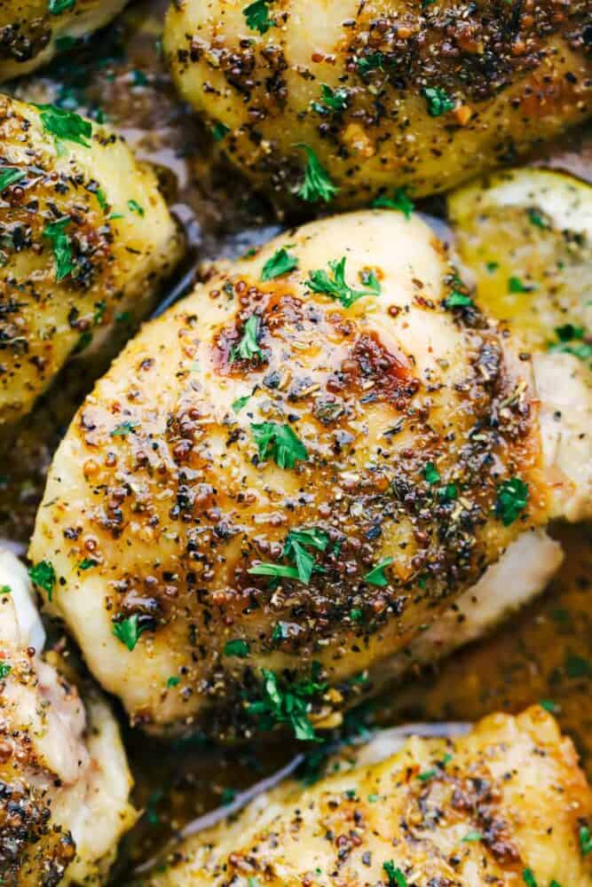 Baked chicken thighs close up.