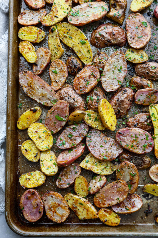 Fingerling potatoes on a baking sheet.