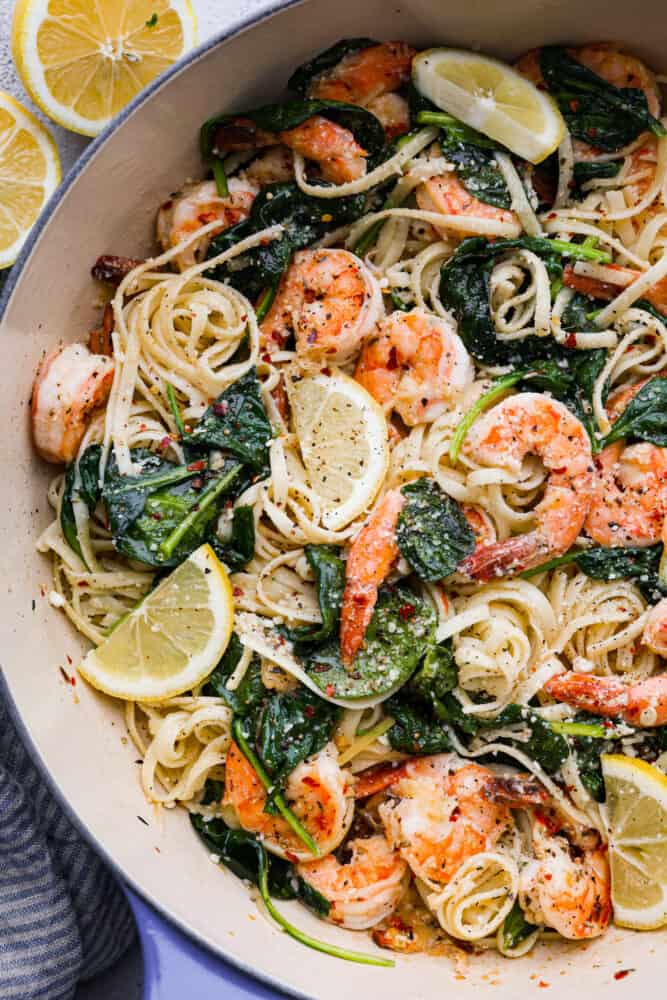 A close up on lemon garlic parmesan shrimp pasta in the pan.