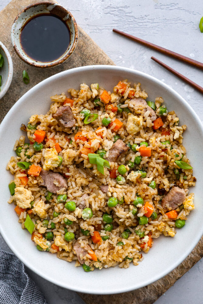 A bowl of pork fried rice.