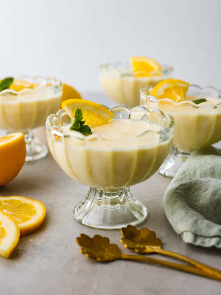 Hero image of lemon posset served in glass cups.